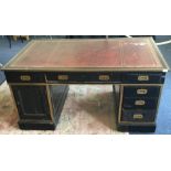 A good ebony and brass mounted twin pedestal desk.