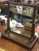 A good mahogany swing handled mirror.