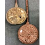 A good Antique copper hinged topped warming pan together with one other.