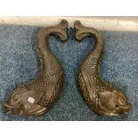 A pair of heavy Antique brass brackets in the form of sea creatures.