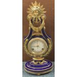 A good gilt and porcelain Swiss made mantle clock.