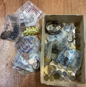 A large quantity of coins, costume jewellery etc.