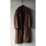 Two sheepskin coats together with two leather coats.