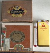 A box of Montecristo cigars together with other cigars.