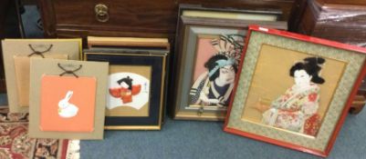 A large collection of Oriental pictures and silks.