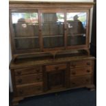 A large oak dresser with drawers to base. Est. £80