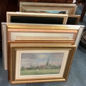 A large collection of framed prints etc.