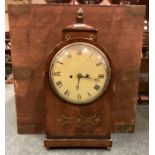 A good mahogany mantle clock with brass inlay.