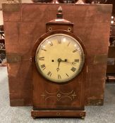 A good mahogany mantle clock with brass inlay.