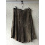 A leather coat together with one skirt. All size 10.