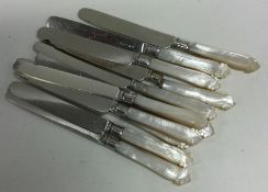 A set of silver plated and MOP dessert knives.