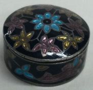 A silver and enamelled box. Marked to base.