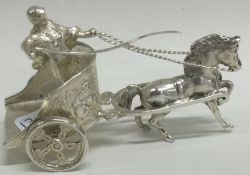 A silver figure of a gladiator and chariot. London 1967.