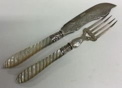A heavy pair of silver mounted fish servers with MOP handles. Birmingham. By GU.