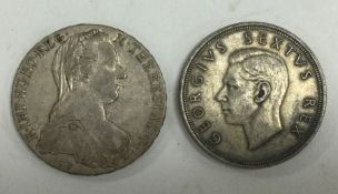 Two old silver crowns.