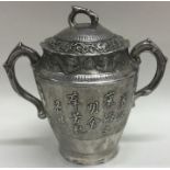 A 19th Century Chinese Provincial silver cup and cover engraved with Chinese writing.