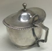 A heavy Victorian silver mustard pot. London 1845.