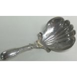 A George III silver caddy spoon. Birmingham 1826.