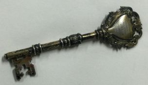 A heavy silver gilt key. Birmingham 1930. By JWT.
