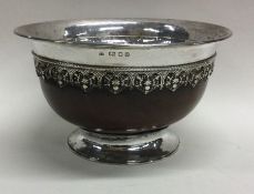 OMAR RAMSDEN: A silver and wood bowl. London 1931.