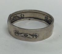 LIBERTY & CO: A silver bracelet / napkin ring. Birmingham 1910.