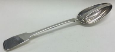 A solid George III silver divider basting spoon. London 1829. By John Hawkins.