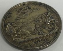 An early 17th Century silver coin.