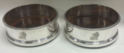A good pair of heavy crested silver coasters. London 1979. By Spink & Son.