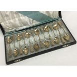 A fine set of twelve French silver gilt teaspoons contained within a fitted box.