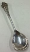 GARRARD & CO: A silver honey spoon. London 1969.