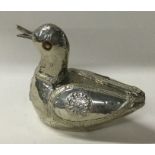 A silver figure of duck.