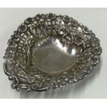 A Victorian silver pierced heart shaped dish decorated with swags. Birmingham 1900. By CS&FS.