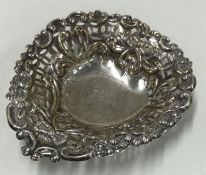 A Victorian silver pierced heart shaped dish decorated with swags. Birmingham 1900. By CS&FS.