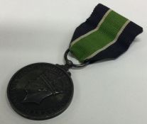 A Colonial Police Force George IV silver medallion.