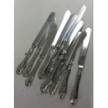 A quantity of silver handled knives.