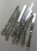 A quantity of silver handled knives.