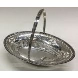 HESTER BATEMAN: A good quality Georgian silver swing handled sweet basket. London 1787.