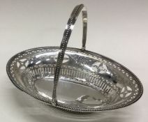 HESTER BATEMAN: A good quality Georgian silver swing handled sweet basket. London 1787.
