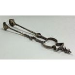 A pair of 18th Century Georgian silver ice tongs. Maker's mark only.