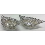 A pair of embossed silver bonbon dishes. Birmingha