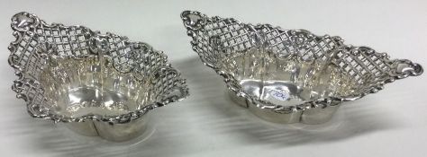 A pair of embossed silver bonbon dishes. Birmingha