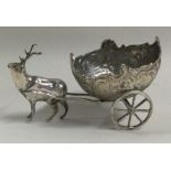 A Continental silver chased sleigh with reindeer.