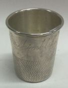 An American silver shot cup inscribed, 'Just a Thimbleful'.