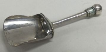 A Georgian silver caddy spoon with bright-cut decorated bowl. Birmingham 1827.