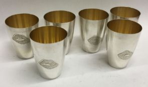 A good set of six heavy Russian silver vodka tots with gilt interiors. Marked to bases.