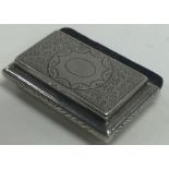 A Victorian silver chased hinged snuff box. London 1898.