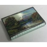 A silver and enamel snuff box embossed with river scenes bearing import marks.