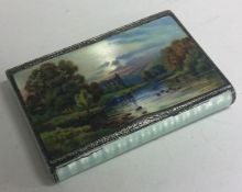 A silver and enamel snuff box embossed with river scenes bearing import marks.