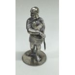 A heavy silver figure of a soldier.