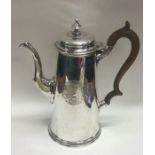 An 18th Century George II straight sided silver coffee pot. London 1733. By Samuel Smith.